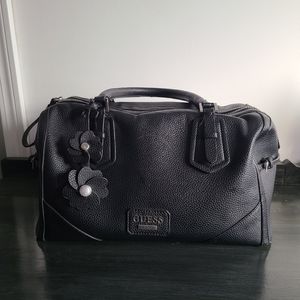 Black Guess purse with flower detail